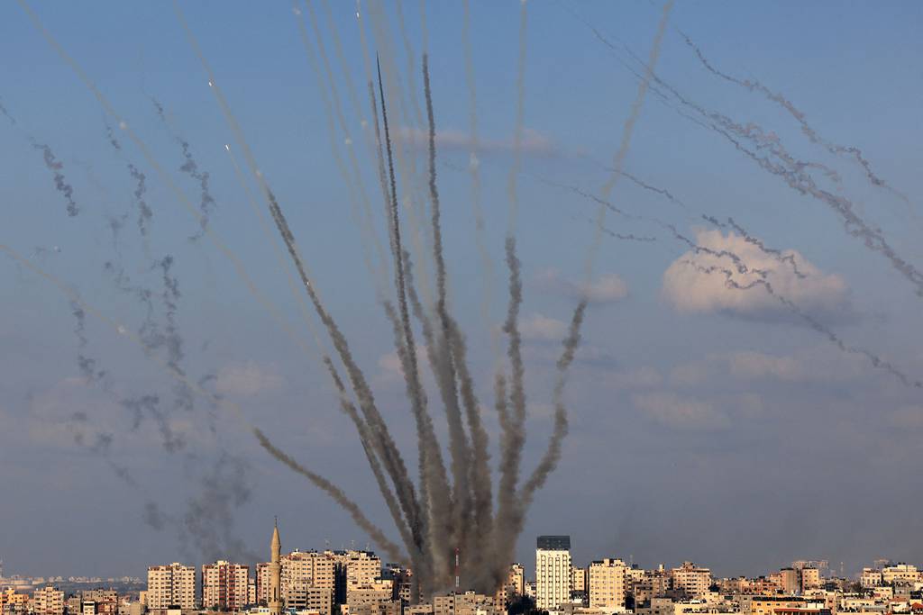 A salvo of rockets is fired by Palestinian militants from Gaza toward Israel on Oct. 10, 2023.