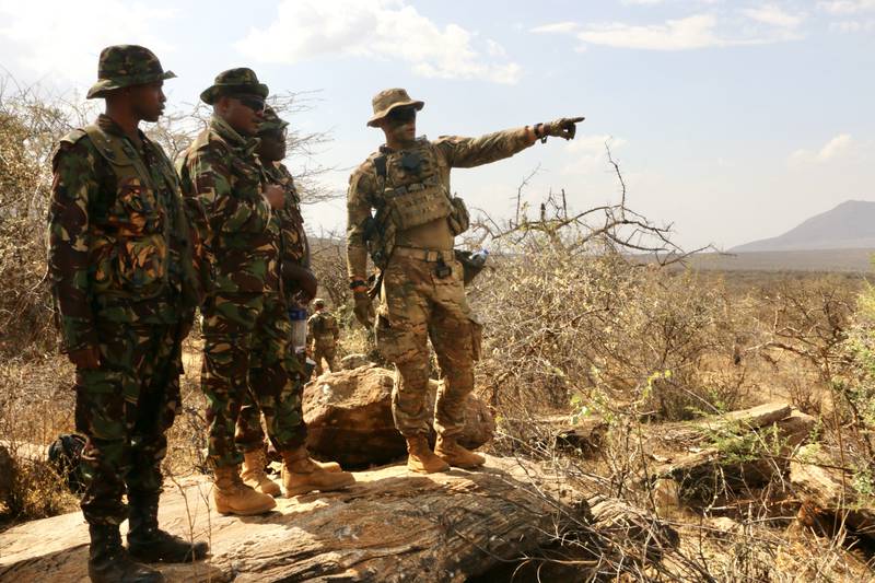 U.S. Army Capt. Nils A. Olsen works with Kenyan Defence Force soldiers during the final training event of Justified Accord in March 2022.