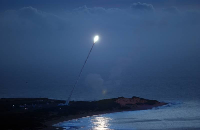 A Standard Missile-3 is launched from the Pearl Harbor-based USS Lake Erie to intercept a threat representative target as part of a Missile Defense Agency test.
