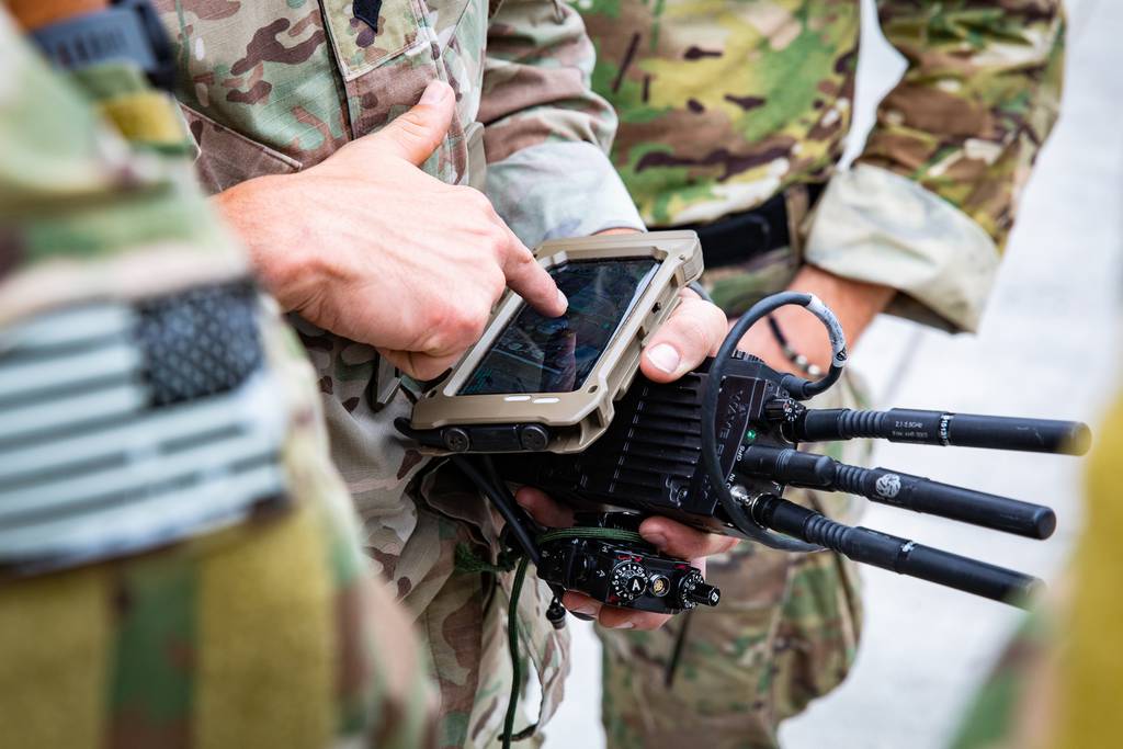 Soldiers from U.S. Army Special Operations Command train with connected devices in preparation for their employment during Project Convergence 22.