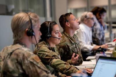 The 1st Range Operations Squadron range operations commanders manage operations inside the Morrell Operations Center in support of the Orbital Flight Test 2 launch, May 19, 2022, Cape Canaveral Space Force Station, Fla. The MOC supports every space launch from CCSFS and Kennedy Space Center. (Senior Airman Dakota Raub/Space Force)
