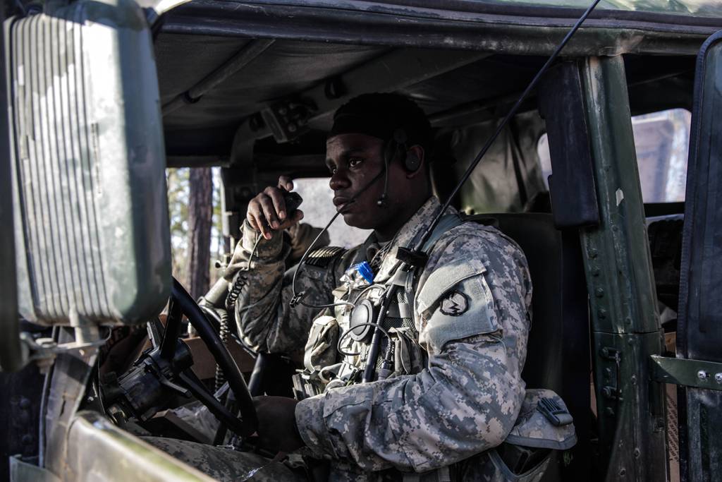A U.S. Army soldier performs a radio check during exercise Hamel 15, a sub-mission of Talisman Sabre, in Shoalwater Bay Training Area, Queensland, Australia on July 11, 2015.