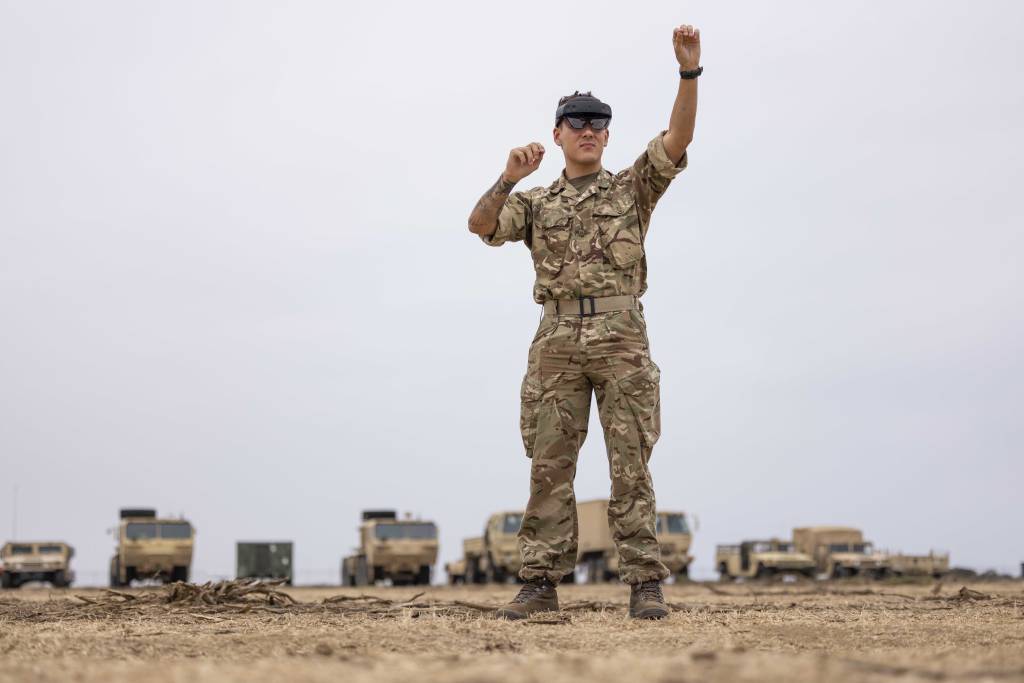 Lance Cpl. Corey Smith-Preston of the British Army experiments with extended reality goggles Camp Pendleton, California, during Project Convergence 22.