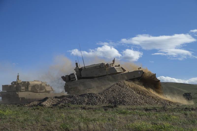 US Marines conduct a breach with Assault Breacher Vehicles during a test of the Robotic Complex Breach Concept at the Yakima Training Center in Yakima, Washington, April 27, 2019.