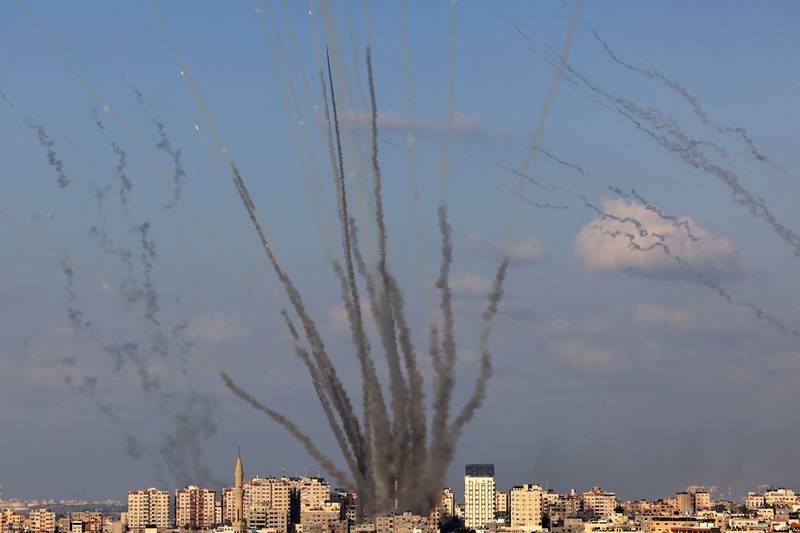 A salvo of rockets is fired by Palestinian militants from Gaza toward Israel on Oct. 10, 2023.