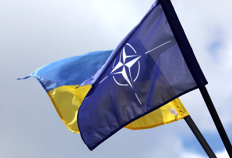 The NATO and Ukrainian flag are pictured in Vilnius, Lithuania on July 9, 2023, a few days ahead of a July 11-12 NATO Summit.