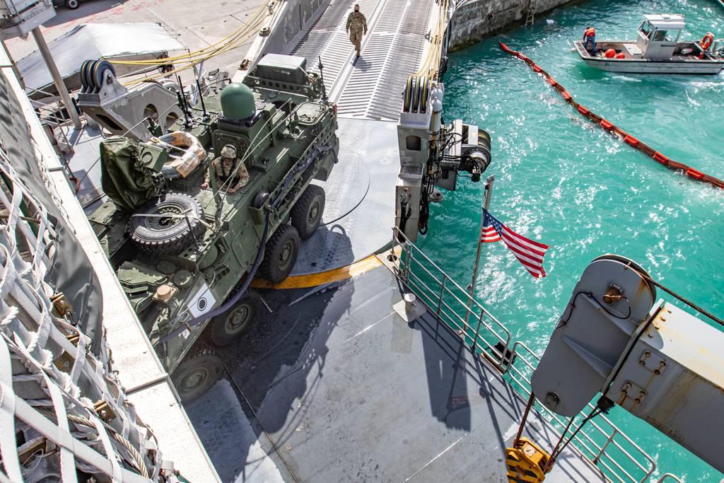 U.S. Army soldiers assigned to the I Corps conduct roll on-roll off training with a Stryker combat vehicle onboard the USNS City of Bismarck at Naval Base Guam, Feb. 9, 2022