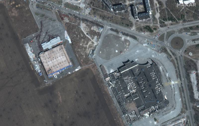 Satellite image shows people waiting for food at Metro Shopping Center, Mariupol, Ukraine, March 29, 2022.