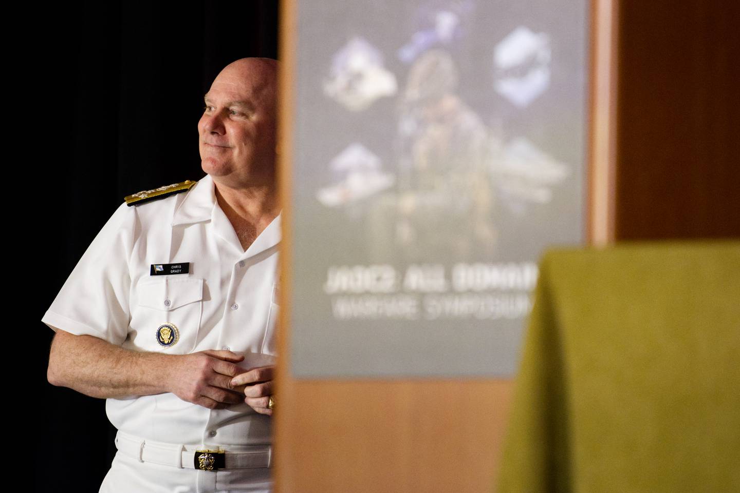 U.S. Navy Adm. Chris Grady, the vice chairman of the Joint Chiefs of Staff, waits to be introduced at a National Defense Industrial Association event in Alexandria, Virginia, on July 18, 2023.