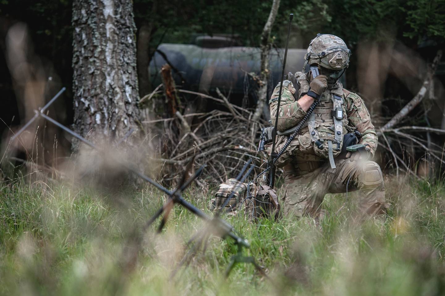 Sgt. Jarred Mertz conducts a radio check with a tactical operations center during Exercise Saber Junction 2019 in Hohenfels Training Area, Germany.