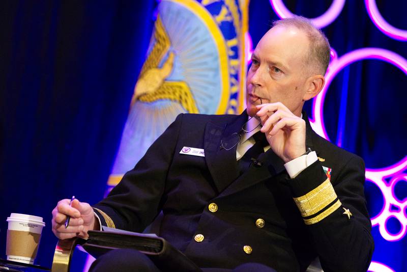 U.S. Navy Rear Adm. Doug Small, the leader of both Project Overmatch and Naval Information Warfare Systems Command, listens to a question at the Sea-Air-Space conference in National Harbor, Maryland, on April 4, 2023.