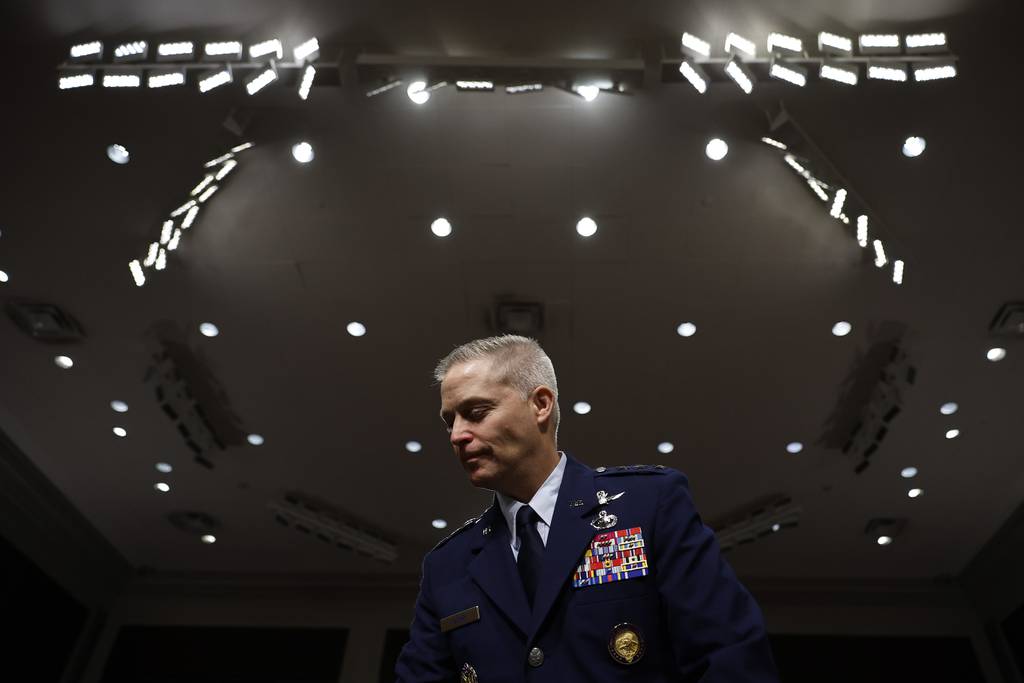 U.S. Air Force Lt. Gen. Timothy Haugh prepares to testify before the Senate Armed Services Committee on July 20, 2023, in Washington, D.C.